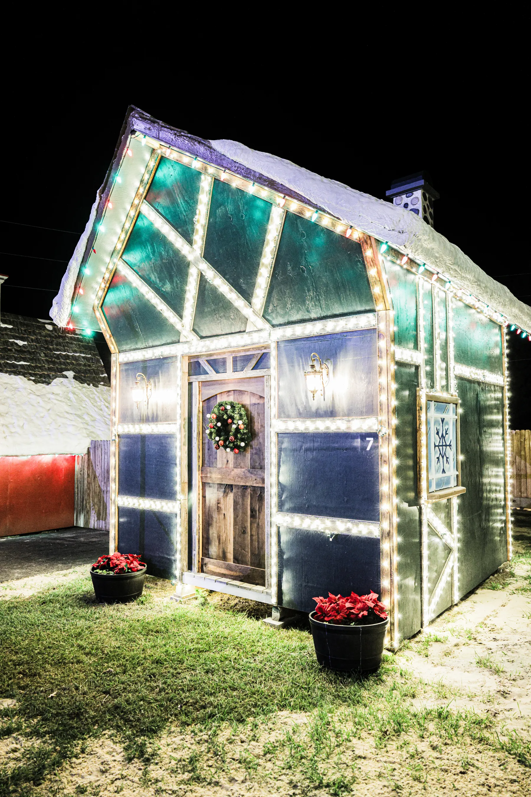 Commercial Christmas lighting display across a Texas property