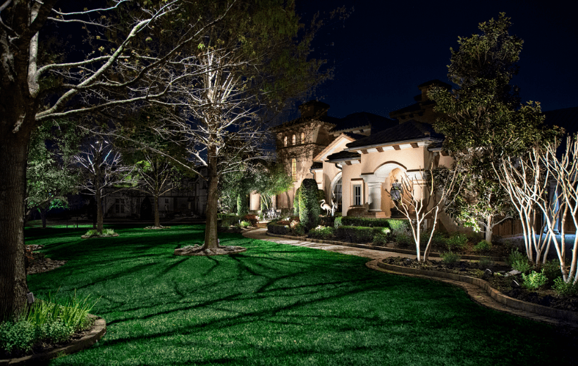 front yard with outdoor lighting
