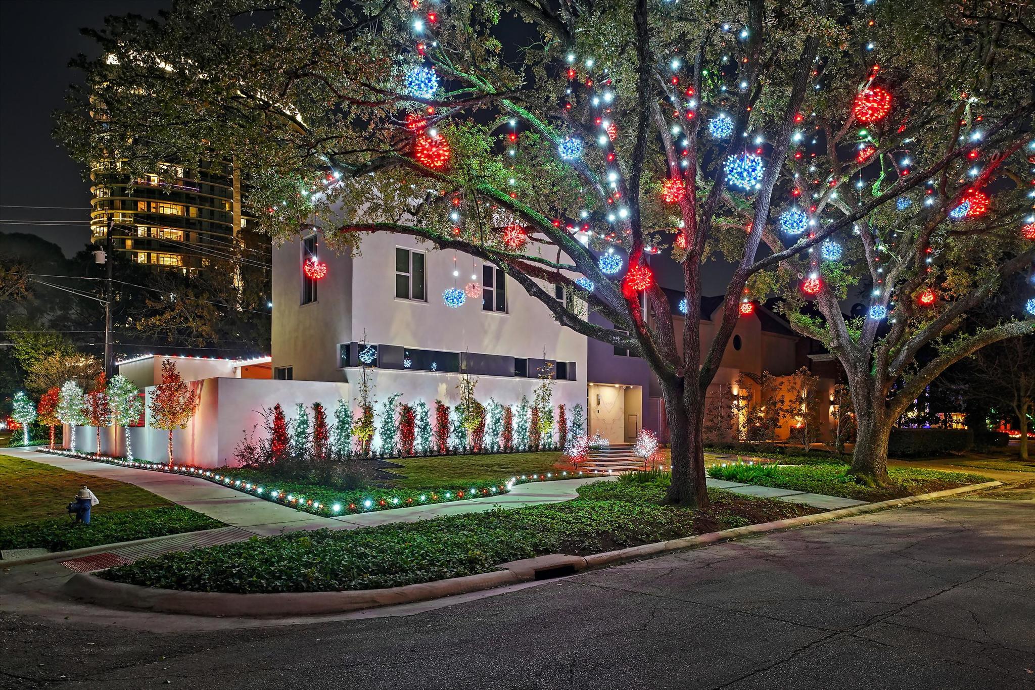 home adorned with holiday lights