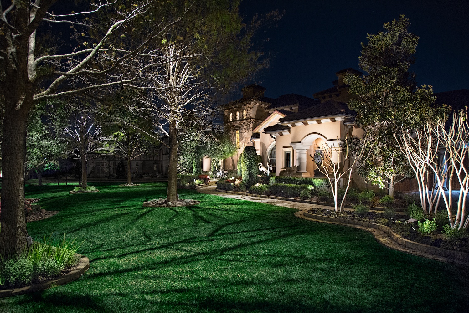 outdoor landscape lighting on texas home
